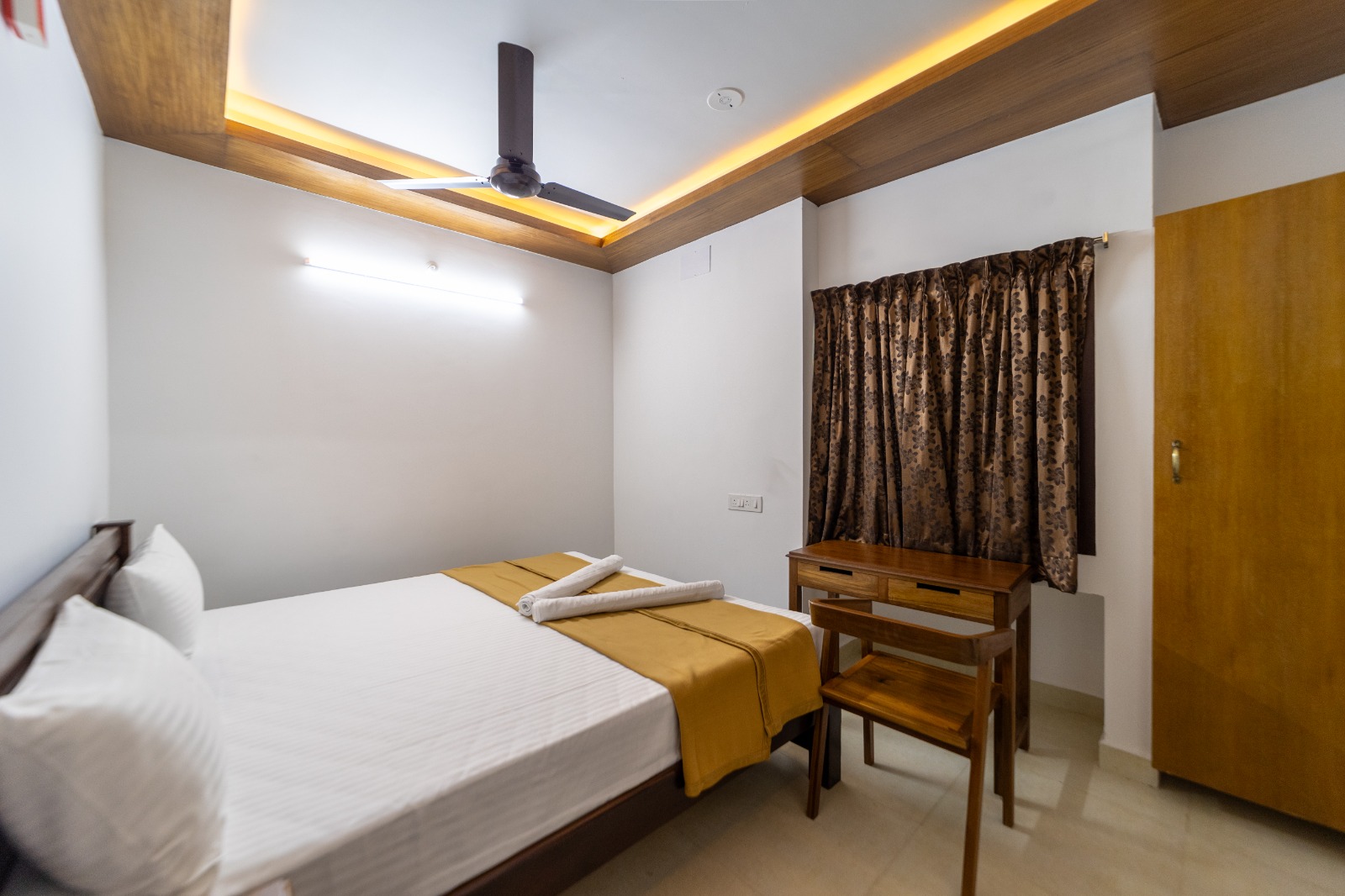 Standard Premium Room with upgraded bedding and bright window view
